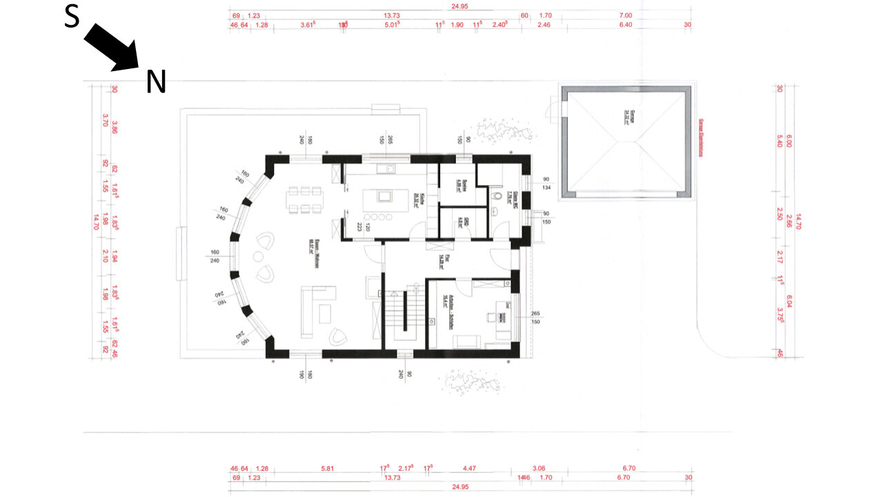 Grundriss eines Hauses von oben: Wohnzimmer, Küche, Schlafzimmer, Bad und Flur.
