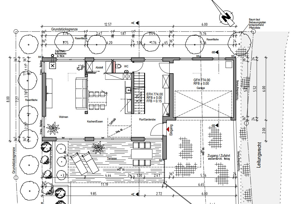 Grundriss eines Einfamilienhauses mit Wohnzimmer, Küche, Terrasse und Garage