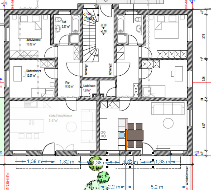 Grundriss eines Wohnhauses mit Schlafzimmer, Kinderzimmer, Küche/Essen/Wohnen, Bad, Flur, Treppenhaus