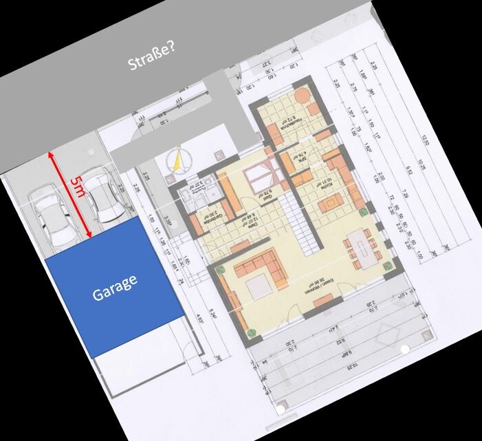 Grundriss eines Hauses: Garage links, Wohn- und Essbereich, Küche; Straße oben.