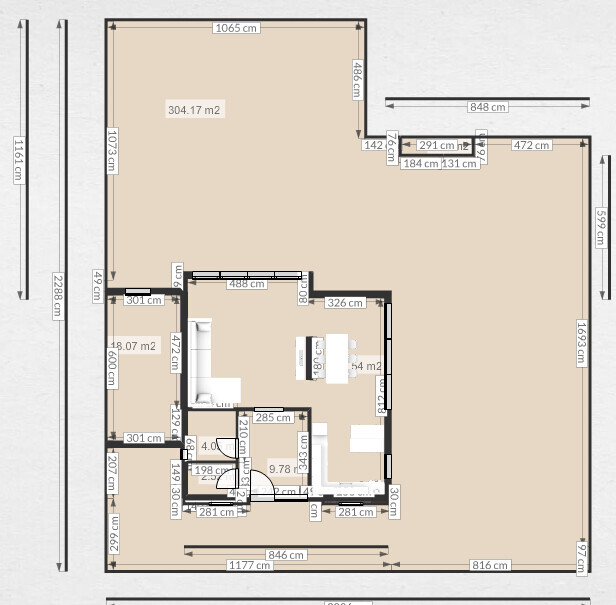 2D-Hausgrundriss mit Küche, Wohnzimmer und Schlafzimmer, inklusive Maßangaben