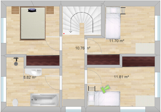 Grundriss einer Wohnung mit Treppenhaus, Flur, zwei Schlafzimmern und Badezimmer.
