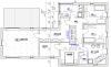 Grundriss eines Hauses mit mehreren Zimmern: Küche, Wohnzimmer, Bad
