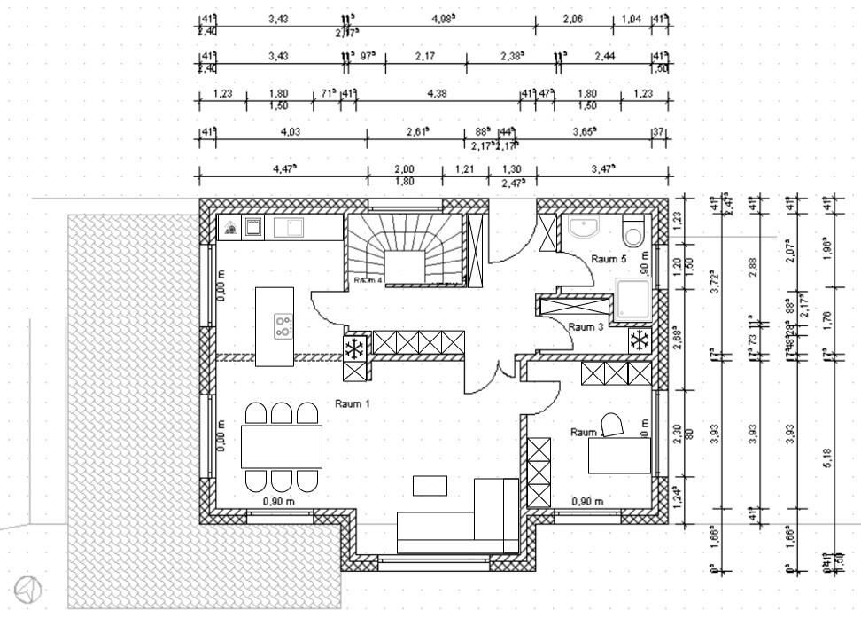 Grundriss eines Hauses: Küche, Esstisch, Wohnzimmer, Treppenhaus.