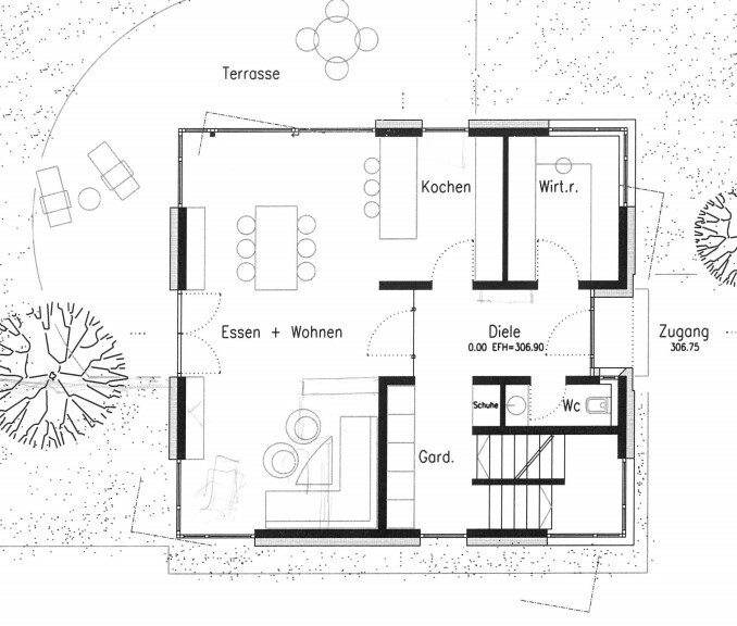 Grundriss eines Hauses: Essen + Wohnen, Küche, Diele, Garderobe, WC, Terrasse.