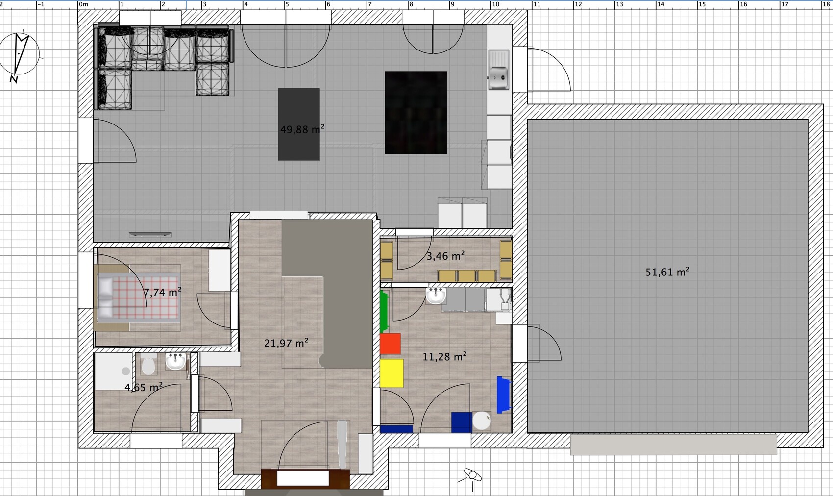 Grundriss eines Hauses: Wohnzimmer, Küche, Bad, Schlafzimmer, Kinderzimmer und große Garage