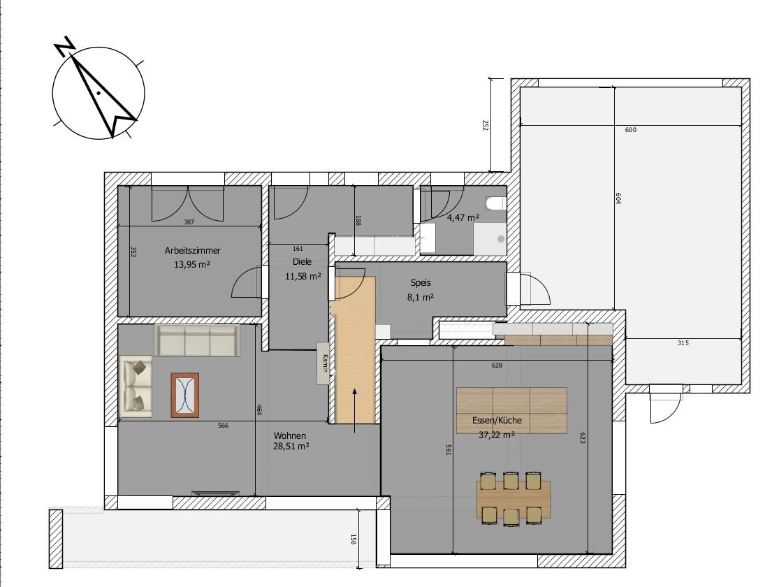 Grundriss eines Hauses: Wohnen, Arbeitszimmer, Diele, Speis, Essen/Küche, Garage; Kompass.