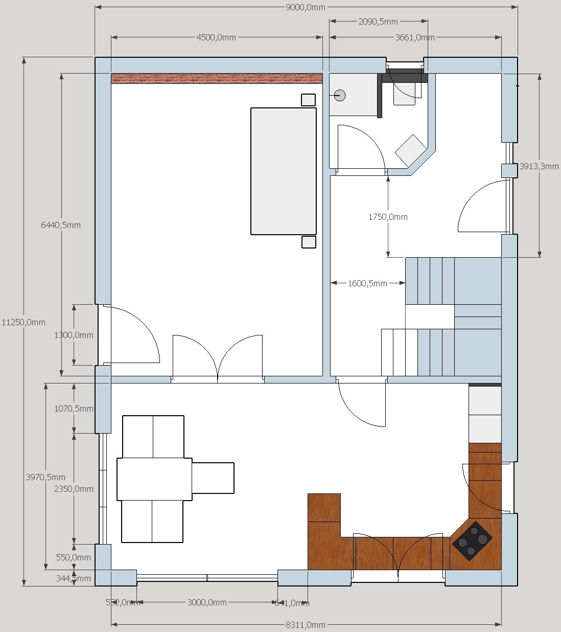 Grundriss einer Wohnung: Schlafzimmer links, Bad oben, Küche rechts, Wohnbereich unten.