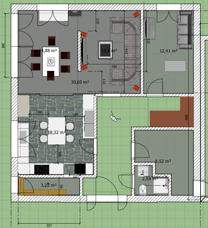 Grundriss eines Hauses: Wohnzimmer mit Sofa, Esszimmer, Küche, Bad, Flur und Gartenterrasse.