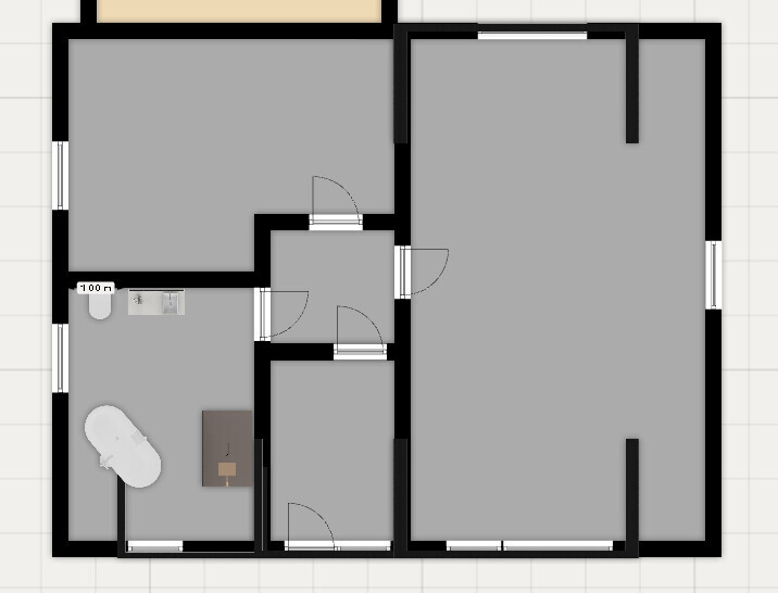Grundriss eines Hauses: Mehrere Zimmer, Badezimmer mit Badewanne, Küche, Flur, großes Wohnzimmer.