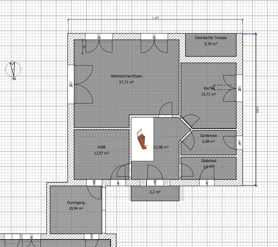 Grundriss: Wohnzimmer/Essen, Küche, HWR, Garderobe, Gästebad, Überdachte Terrasse.