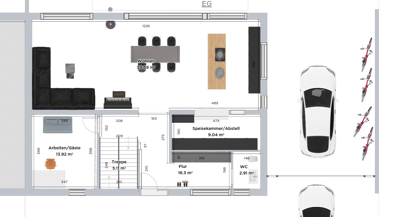Grundriss: Wohnzimmer, Küche, Speisekammer, Flur, Treppe, Arbeits-/Gästezimmer, WC, Garage.
