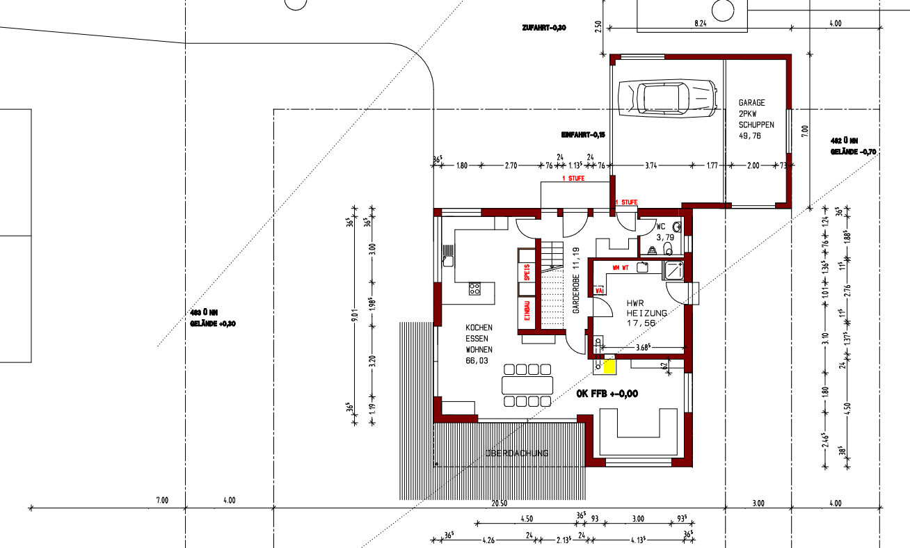 Architekturplan: offener Koch/Essen/Wohnen-Bereich mit Garderobe, HWR (Heizung), WC und Garage.