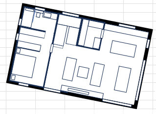2D Grundrissplan eines Hauses mit Wohnzimmer, Küche, Schlafzimmer und Bad.
