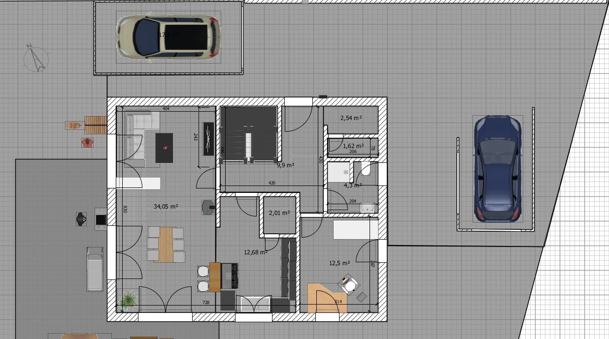Grundriss eines Hauses von oben mit offener Küche, Ess-Bereich, Wohnbereich, Bad, Autos davor.