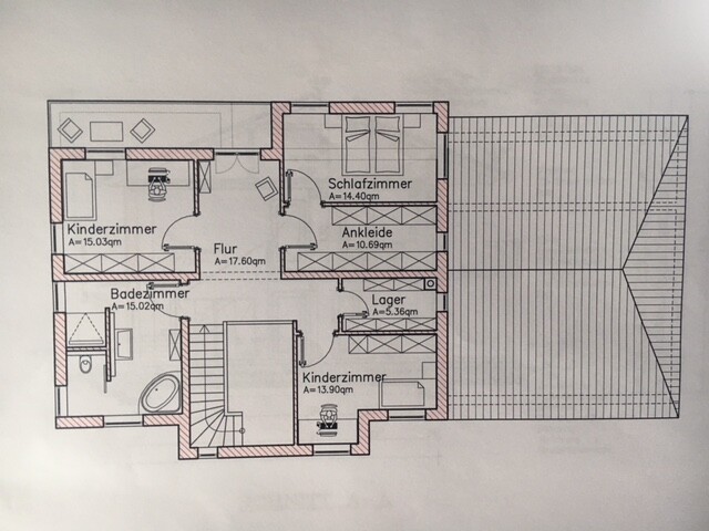 Grundriss eines Hauses mit Flur, Schlafzimmer, Kinderzimmer und Bad sowie Treppe.