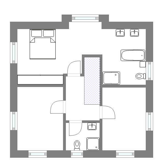 2D-Grundriss eines Hauses mit Schlafzimmern, Badewanne und WC