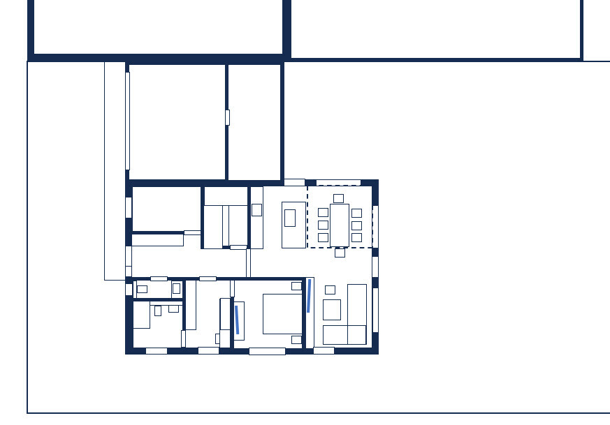Grundriss eines Hauses mit Wohnzimmer, Essbereich, Küche, Schlafzimmern und Fluren.