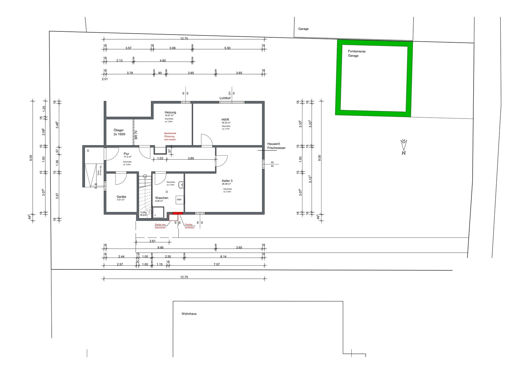 Grundriss eines Hauses mit Heizung, Waschen, Keller und grün markierten Garagenfundamenten.