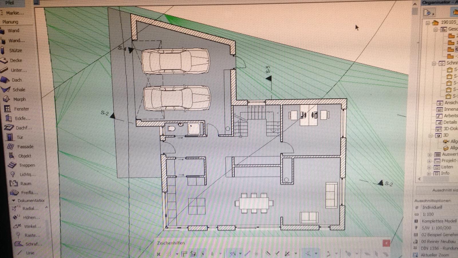 Grundriss eines Hauses mit Doppelgarage, Treppe und offener Wohn- und Essbereich.