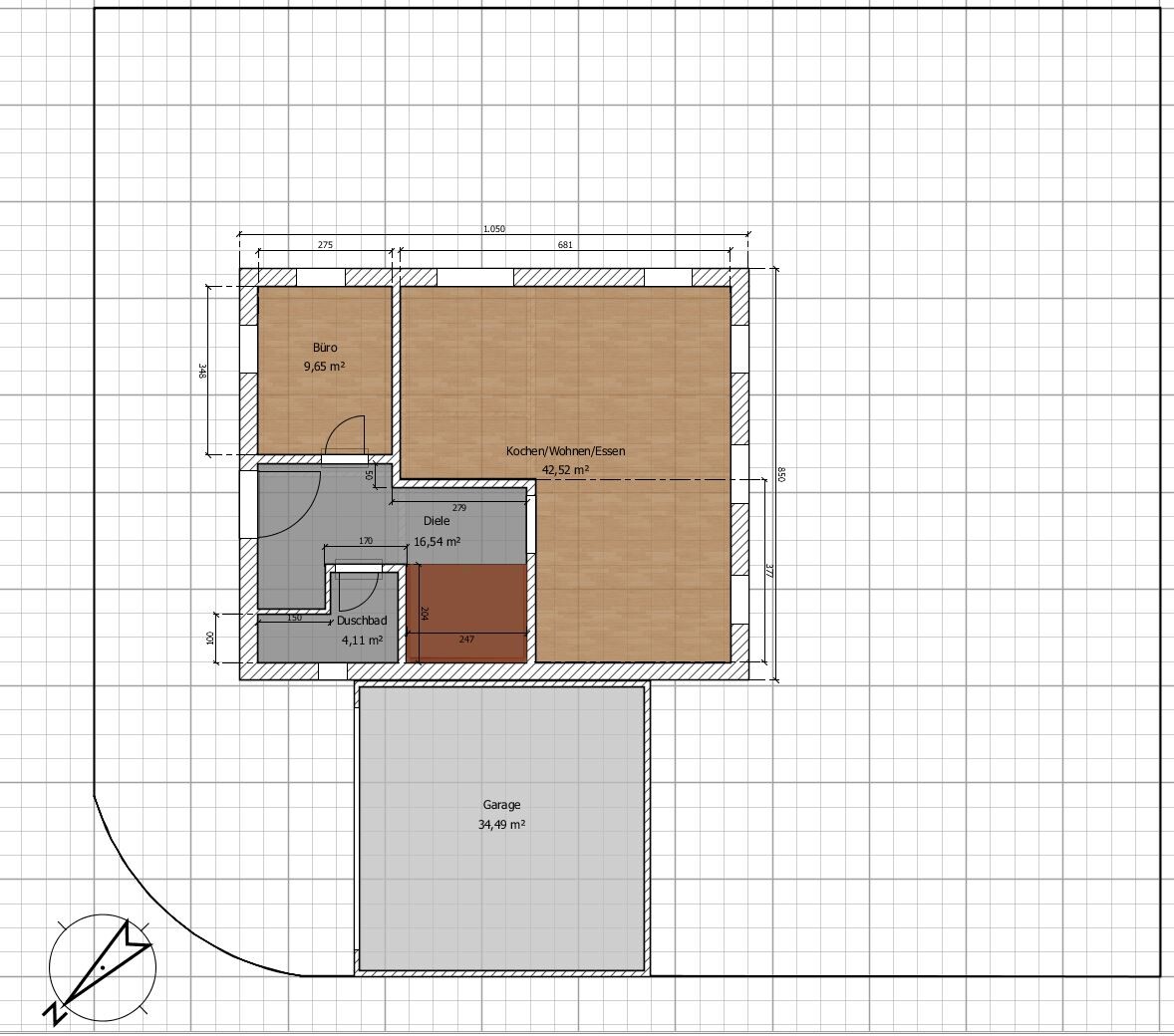 Grundriss eines Hauses: Garage, großer Koch/Wohnen/Essen-Bereich, Büro links, Diele, Duschebad.