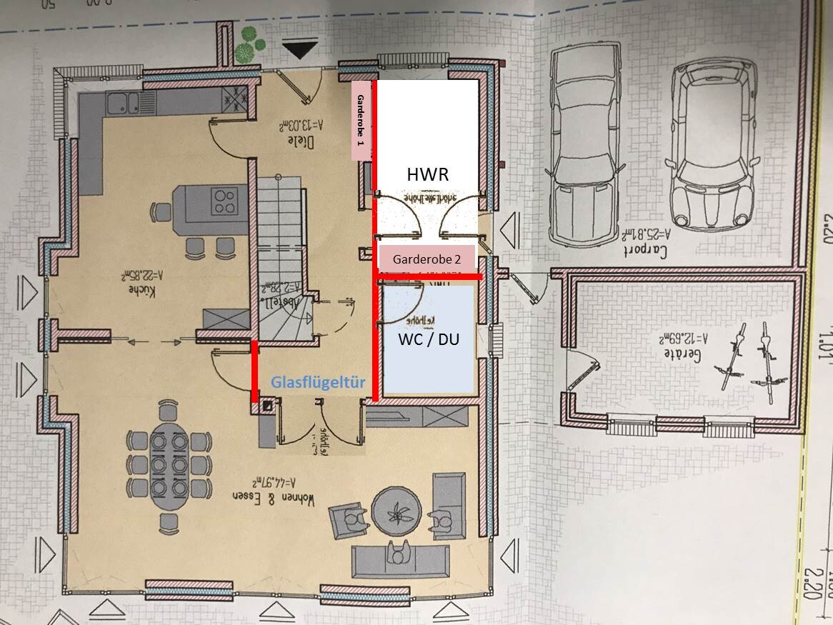 Grundriss eines Hauses mit Küche, Esszimmer, Wohnzimmer, WC, HWR, Garderobe und Garage.
