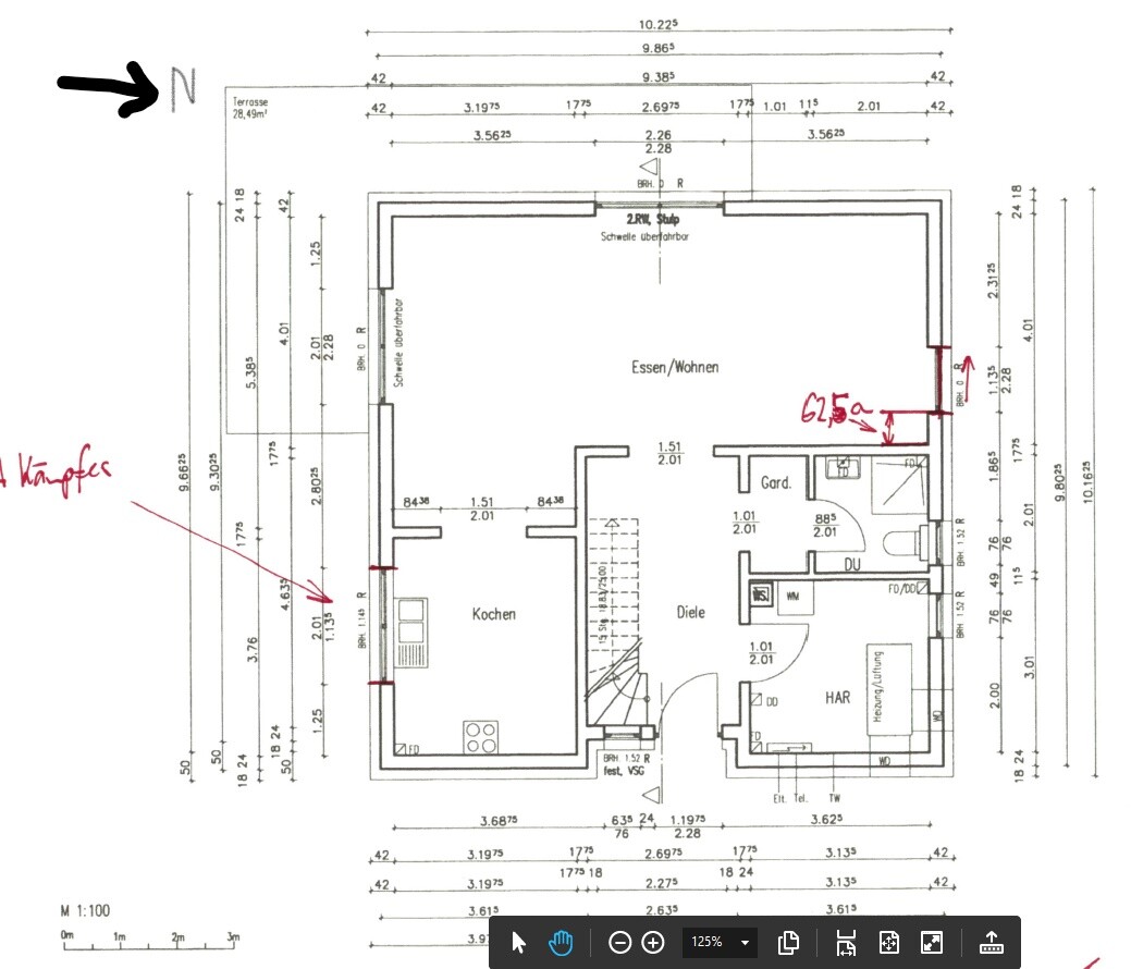 Grundriss eines Hauses mit Küche, Essen/Wohnen, Diele, Garderobe, Bad und Treppe.
