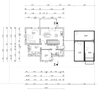 Grundriss eines Wohnhauses mit Wohnzimmer, Küche, Schlafzimmer und Garage