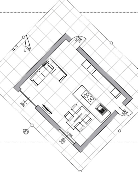 Grundriss eines Wohnraums mit Küche, Kochinsel, Esstisch und Sofa.