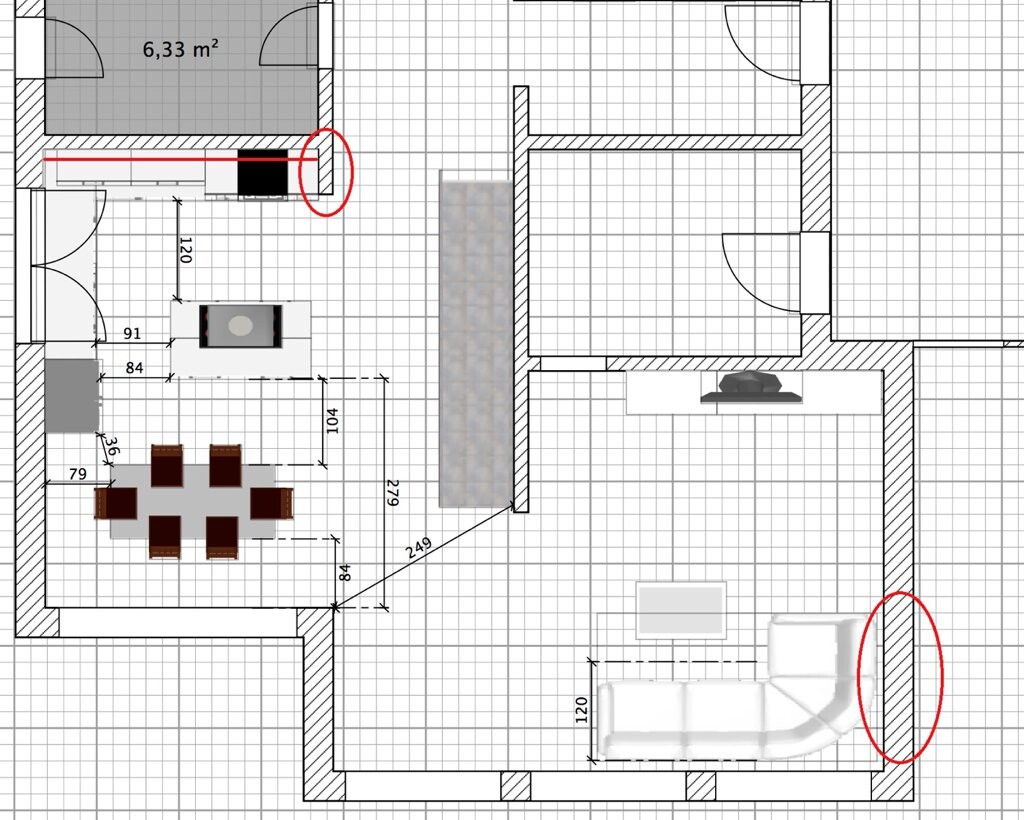 Grundriss eines Wohn- und Essbereichs mit Küche links, Sofa unten rechts; rote Kreise markieren