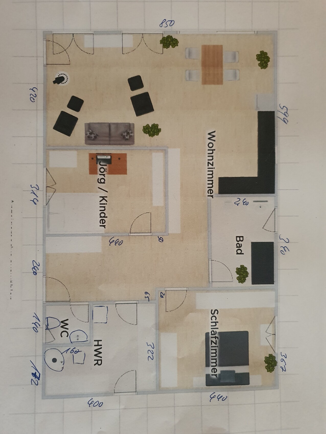 Grundriss einer Wohnung mit Wohnzimmer, Küche, Bad, Schlafzimmer, Kinderzimmer, HWR und WC.