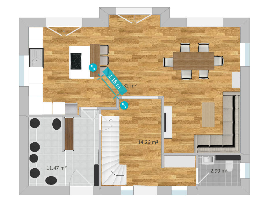 Grundrissplan eines Hauses mit offener Küche, Insel, Esstisch, Wohnzimmer und Treppe