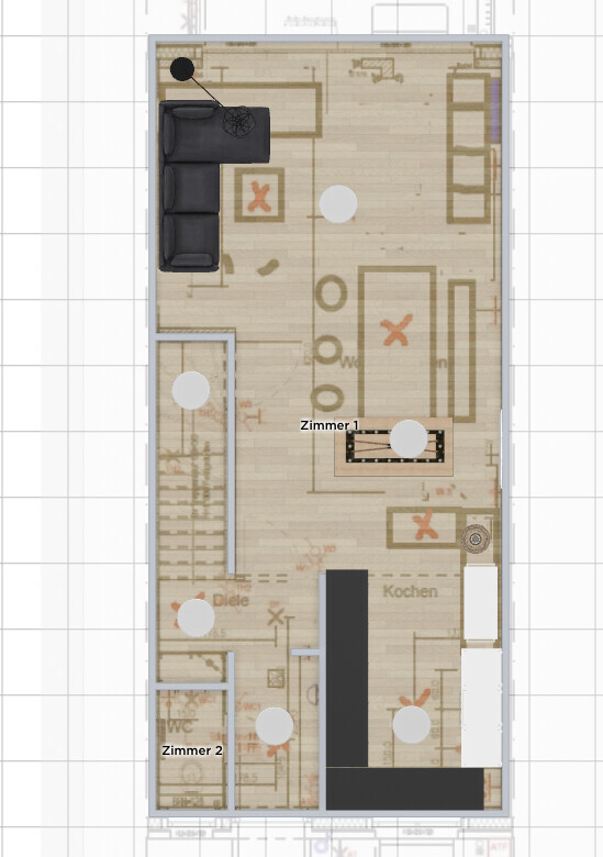 Grundriss eines Apartments: zwei Zimmer, Küche, Diele, Wohnzimmer mit Sofa und Esstisch.