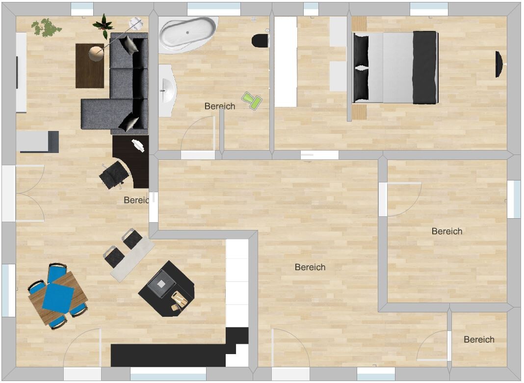 Grundriss einer Wohnung mit Wohnzimmer, Küchen- und Essbereich, Bad und Schlafzimmer.