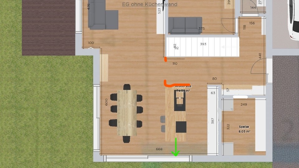 Grundriss eines Hauses mit Wohnzimmer, Essbereich, Küche, Treppen und Terrasse