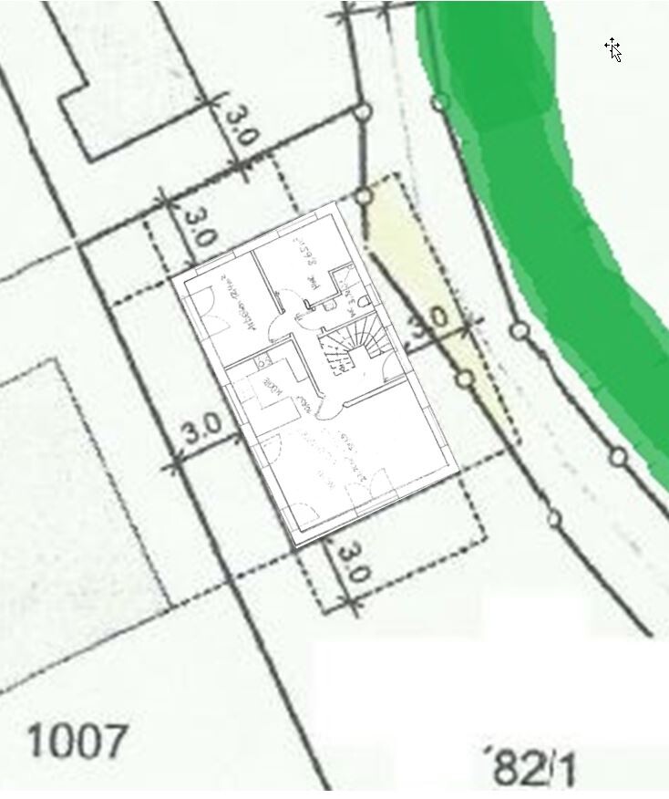 Zweidimensionaler Haus-Grundrissplan mit Innenraumaufteilung und umlaufender Grünfläche.