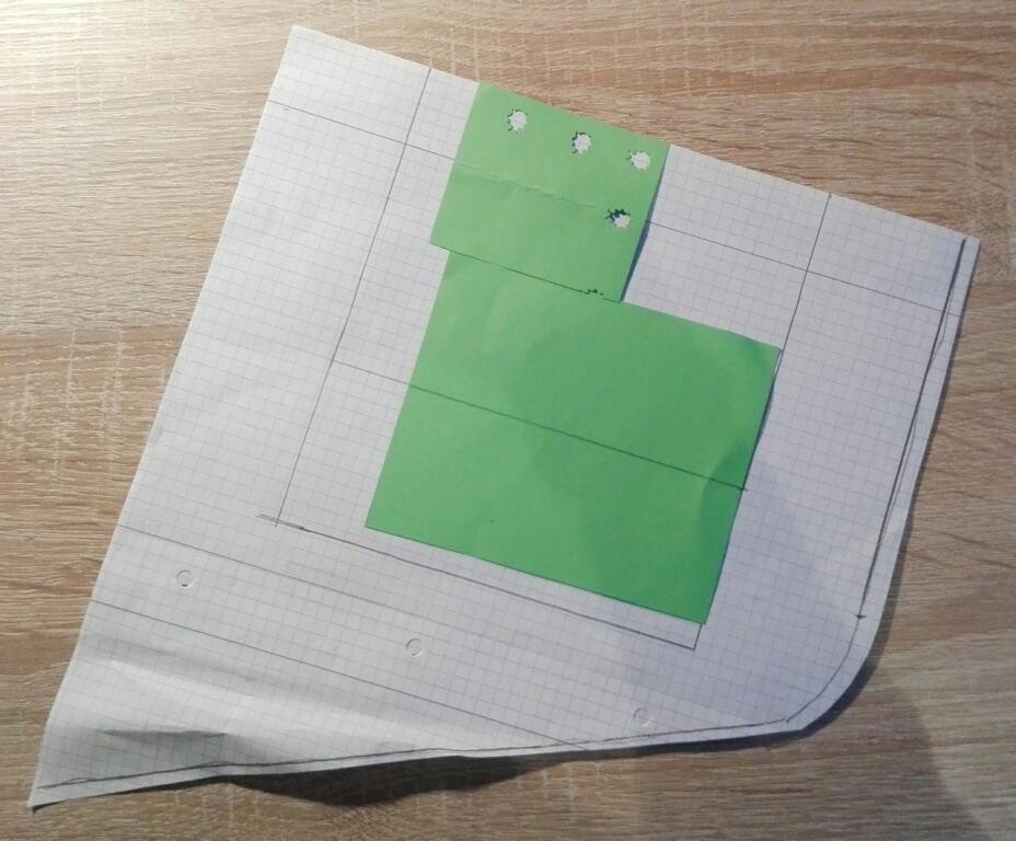 Grundrissplan mit grünen Haftnotizen auf kariertem Planpapier.