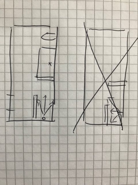 Skizze eines Grundrisses auf kariertem Papier mit zwei Layout-Entwürfen