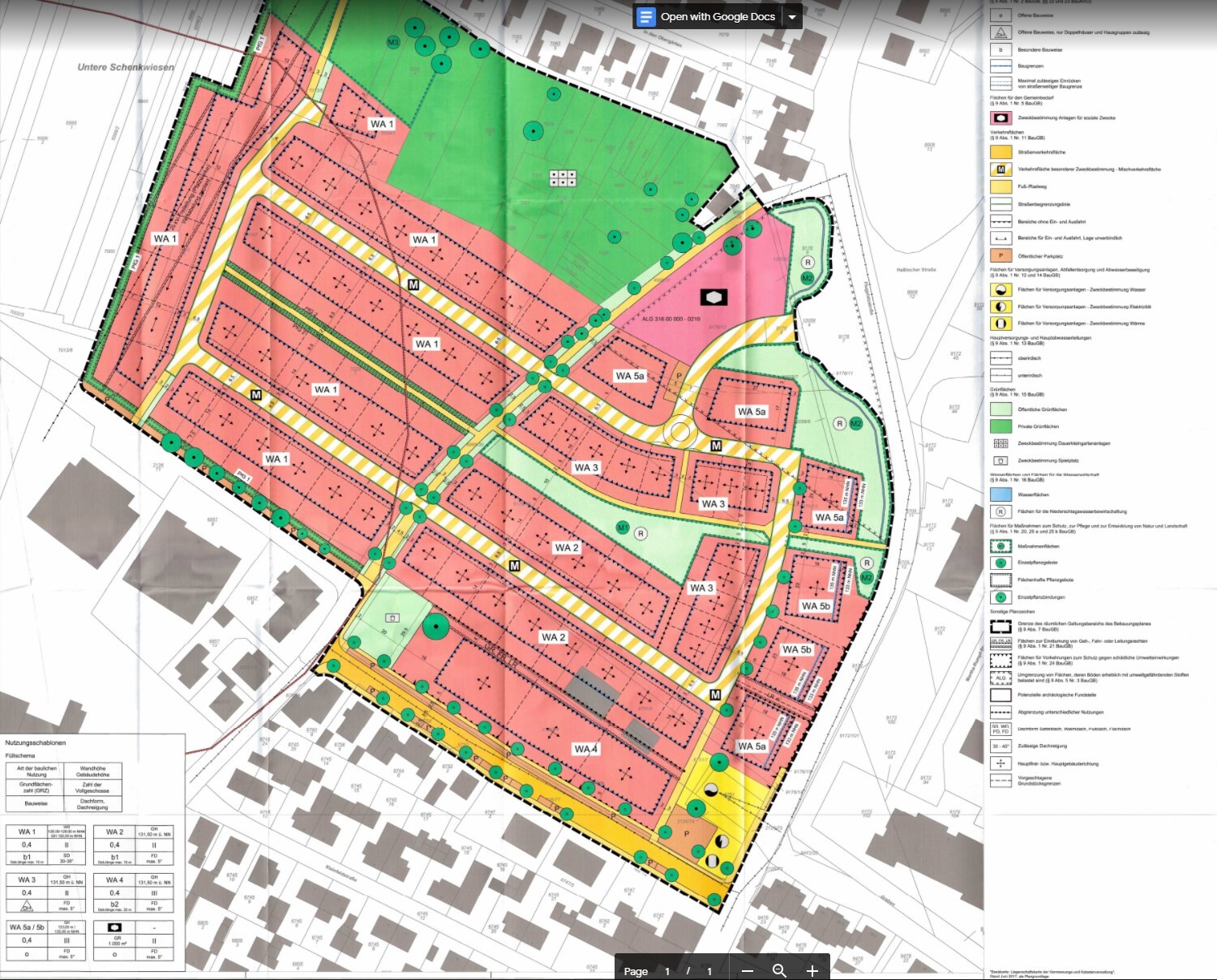 Bebauungsplan: farblich markierte Wohnzonen, Straßenführung und Grünflächen.