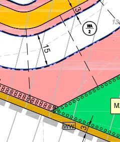 Grundstücksplan mit farblich markierten Zonen, Grenzlinien und Beschriftungen