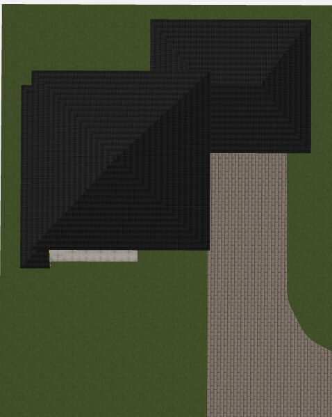 Vogelperspektive: Haus mit dunklem Dach, gepflastertem Zufahrtsweg und Grünfläche.