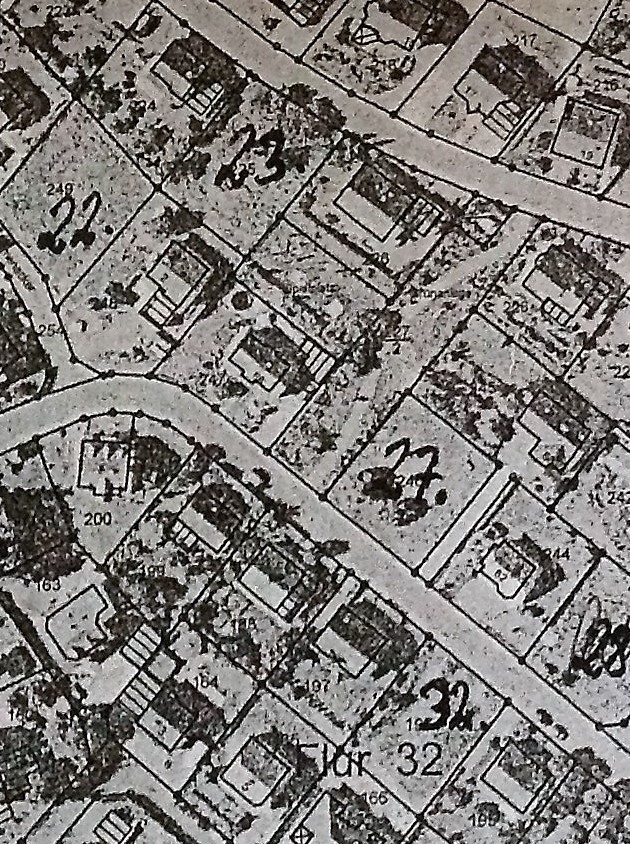 Lageplan eines Wohngebiets mit Grundstücksgrenzen und Häusern