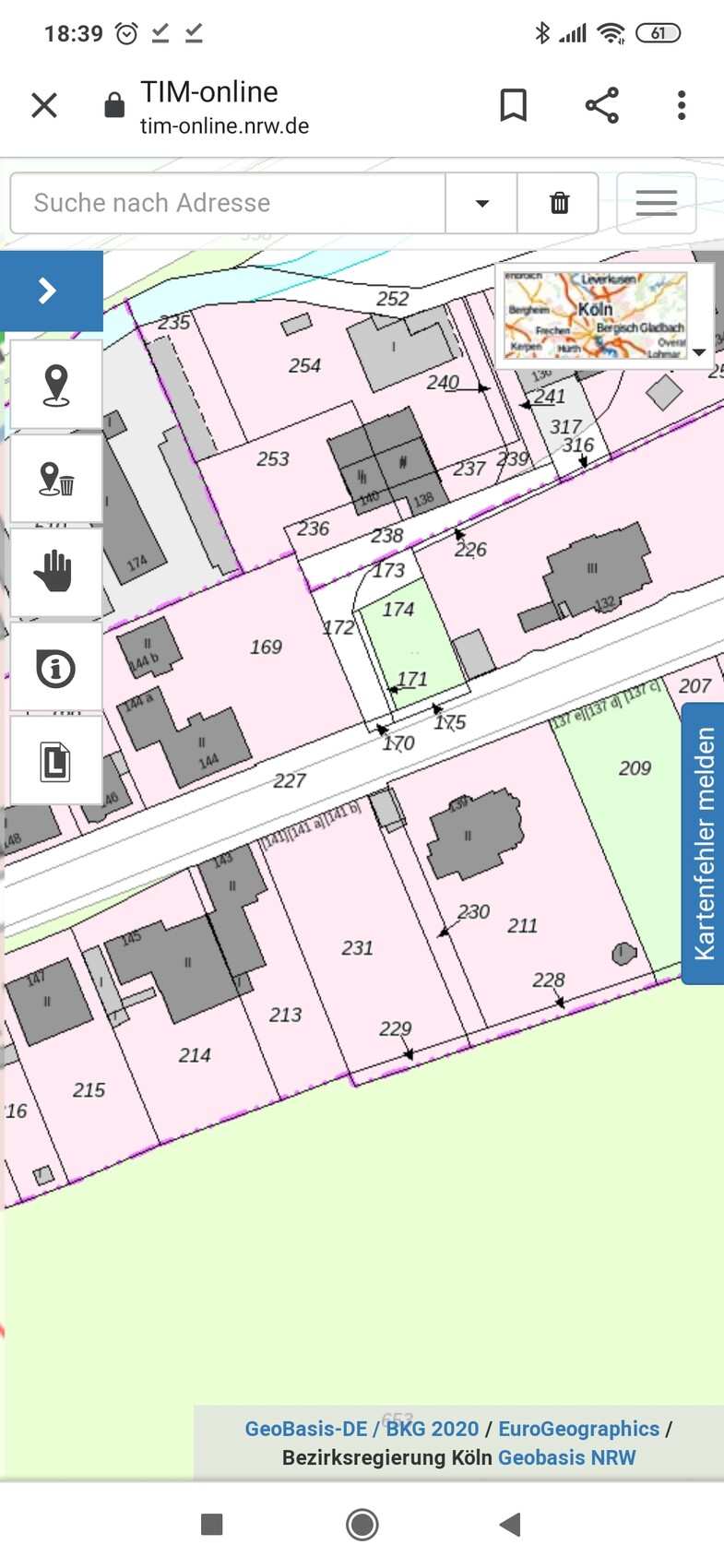 Lageplan einer Siedlung mit Parzellen 169–175, grauen Gebäuden, pinken Flächen und einer Straße.