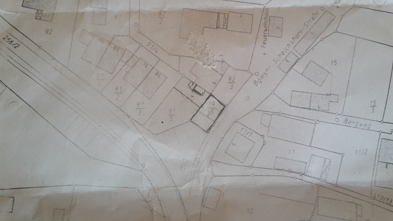 Lageplan mit Parzellen, Grundstücksgrenzen und Gebäudeflächen