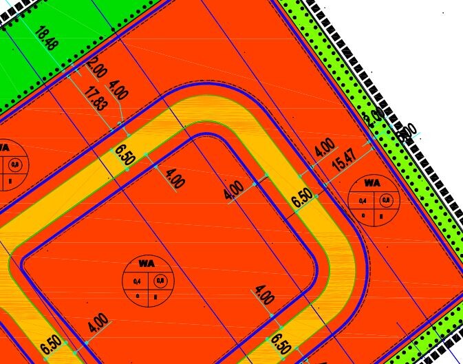 Lageplan eines Baugrundstücks mit farblich markierten Bereichen und Zufahrtswegen