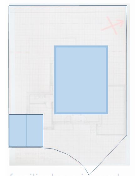 Grundrissplan mit zwei kleinen blauen Rechtecken links unten und einem großen Rechteck in der Mitte.