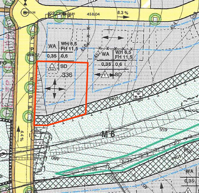 Kartenplan: gelbe Straße links, roter Polygon markiert Baugebiet; blaue Linien/Markierungen.