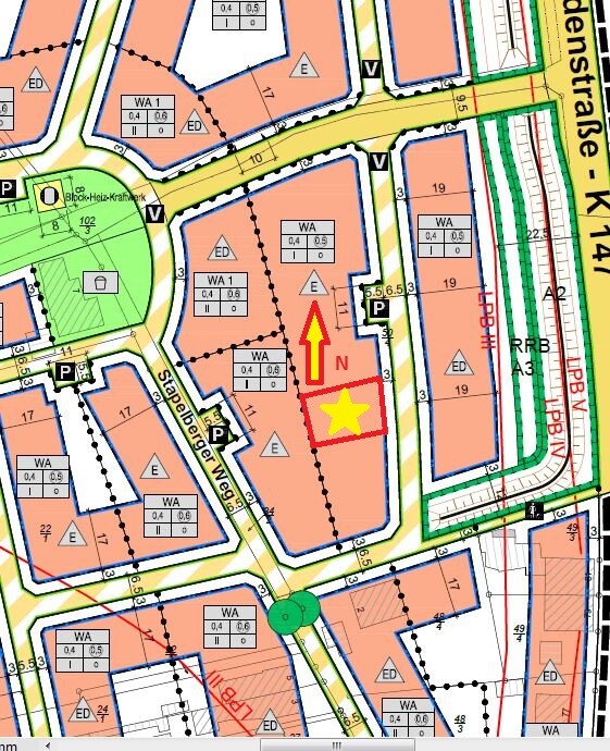 Lageplan eines Bauträgergebiets mit Parzellen, Straßen und Standortmarkierung (Stern)