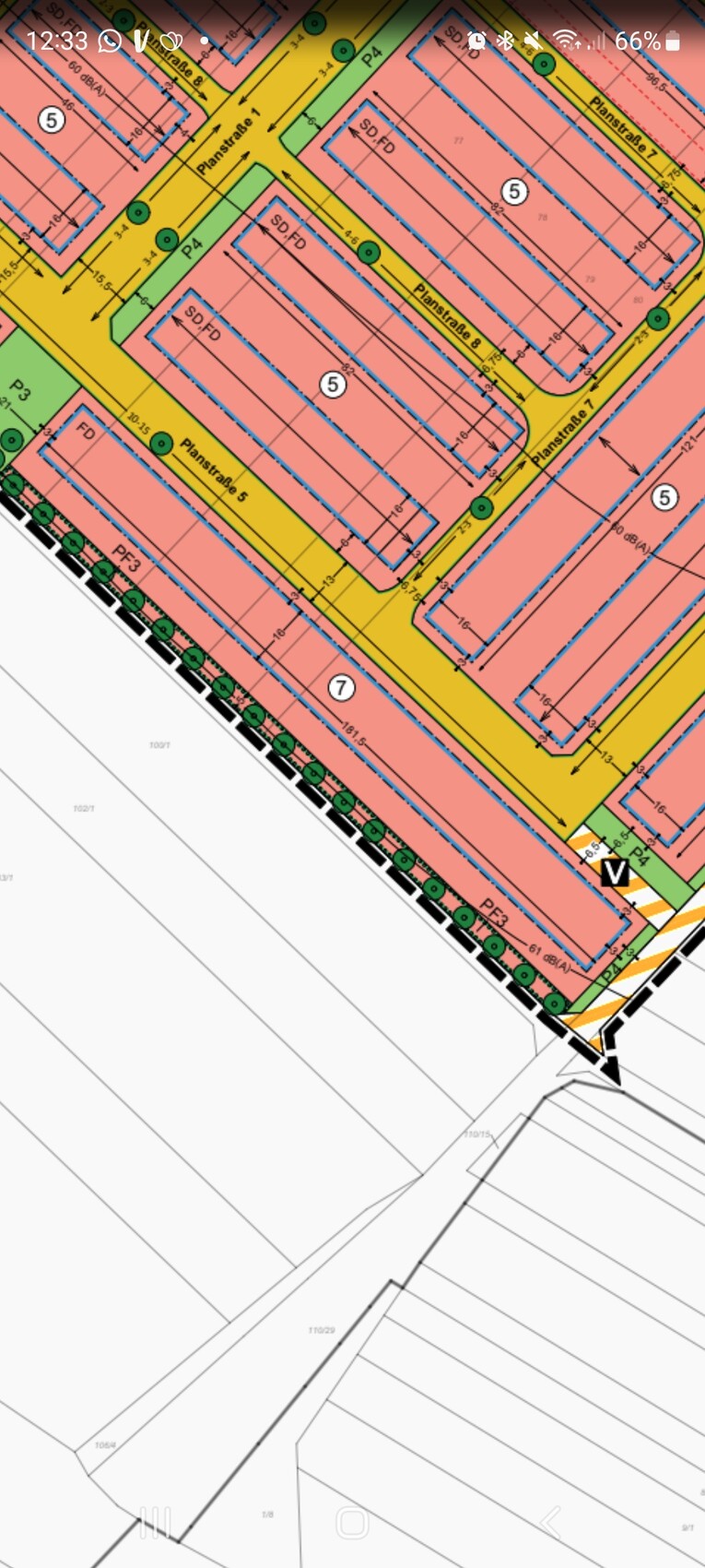 Lageplan eines Baugebietes mit farblich markierten Parzellen, Straßen und Erschließungslinien