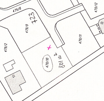 Lageplan eines Grundstücks mit Parzellen, Straßenverlauf und Pink-Markierung